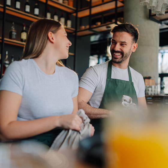 hands holding a person icon representing support and care for individuals in need of help and guidance