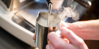 logo for Cornish Espresso Tech featuring a coffee bean and gear design with a modern aesthetic emphasizing quality espresso machines and equipment for enthusiasts and professionals alike 14 brewing techniques